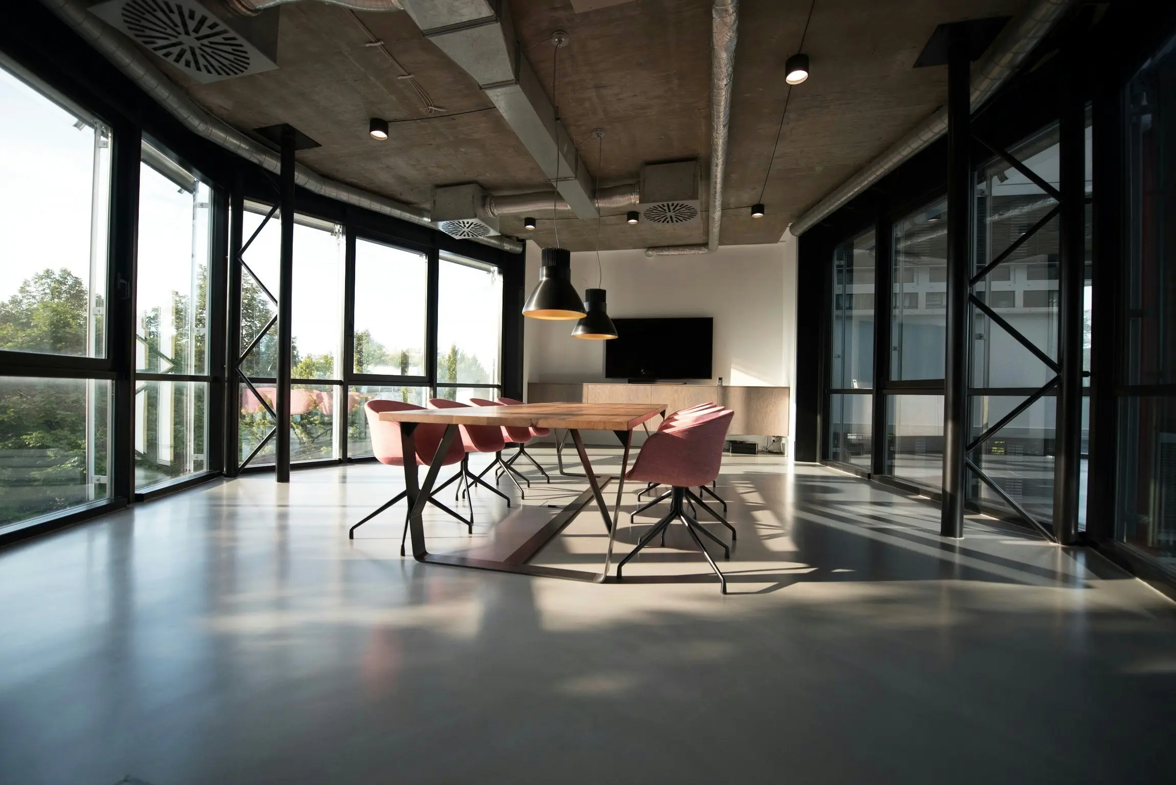 Retail space stripped to bare floors and walls after Spring Cleaning Company removed fixtures and displays in St. Louis, Missouri