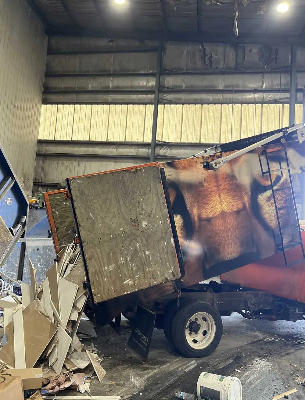 Spring Cleaning Company team loading junk removal truck with unwanted items for eco-friendly disposal in St. Louis, Missouri