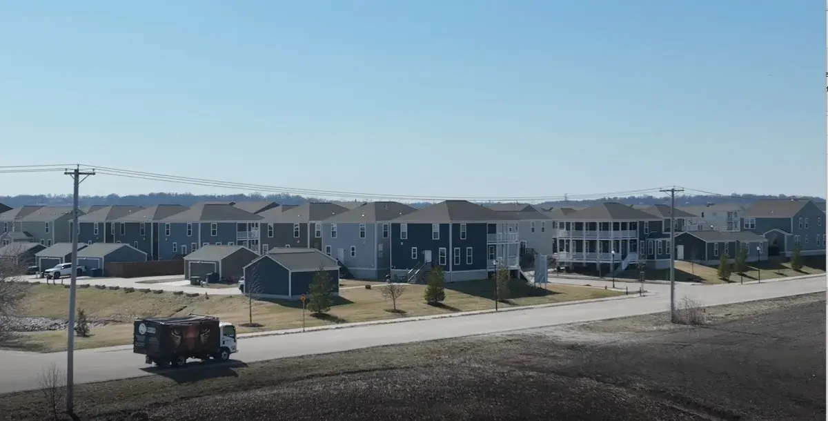Spring Cleaning Company truck driving in New Town, St. Charles, Missouri