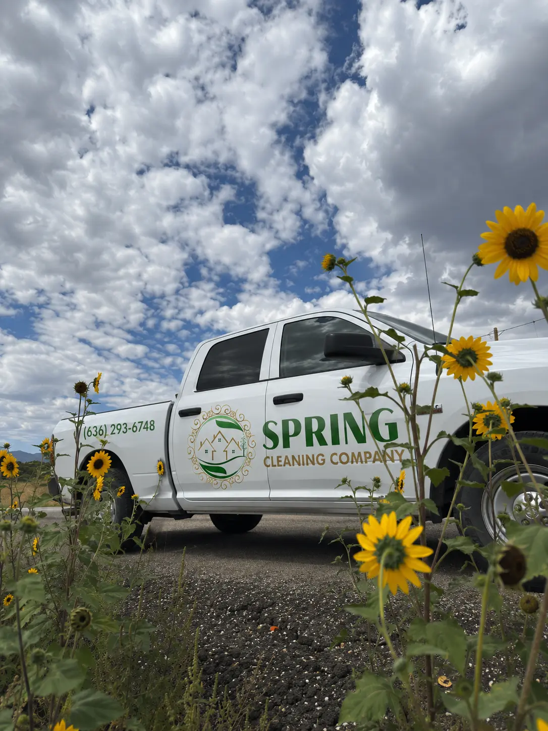 Spring Cleaning Company truck decorated with flowers - eco-friendly junk removal in St. Louis, Missouri